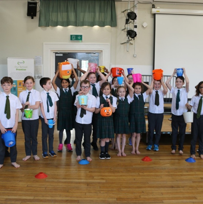News &raquo; Year 4 Take On A Brilliant Bucket Fundraiser For Bwengu